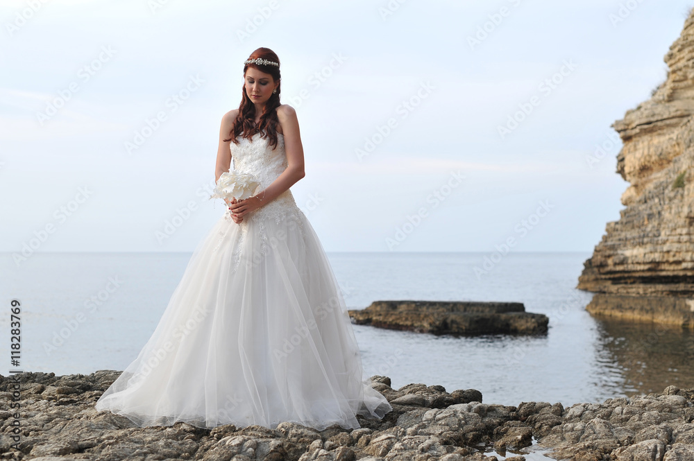 beautiful young bride women wearing white wedding dress