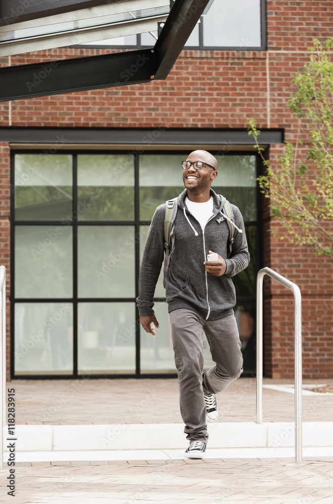 Black man walking in city Black man walking in city