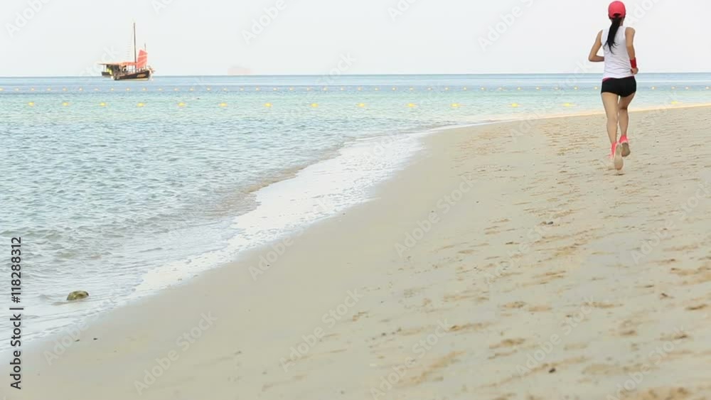 young healthy lifestyle woman running at sunrise beach young healthy lifestyle woman running at sunrise beach