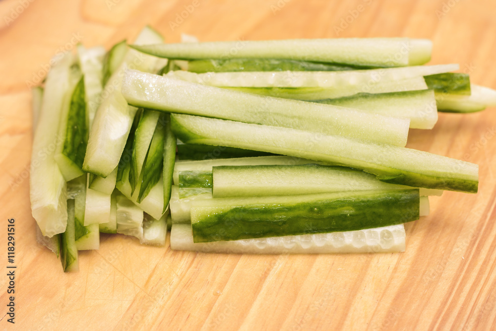 Image of sliced cucumbers on cutting board Image of sliced cucumbers on cutting board