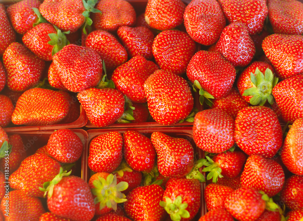 many red strawberries at the market crop view
many red strawberries at the market crop view