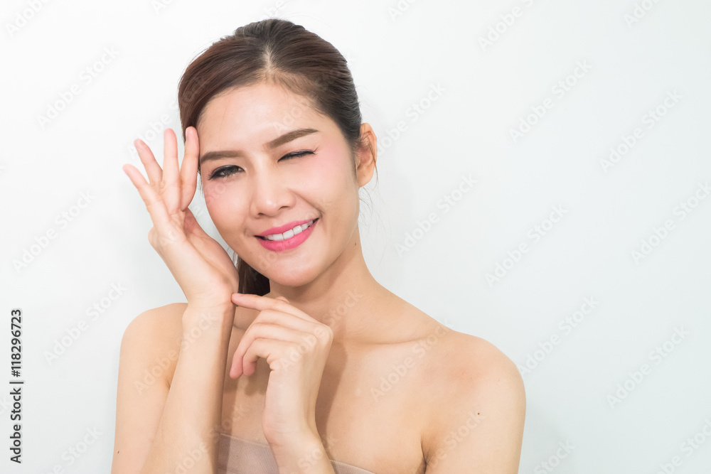 The Portrait of a beautiful female model on white background The Portrait of a beautiful female model on white background