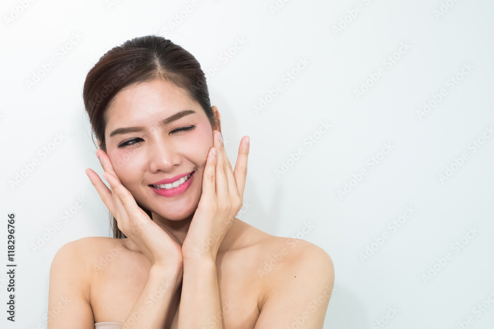 The Portrait of a beautiful female model on white background The Portrait of a beautiful female model on white background