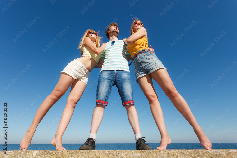 Group friends boy two girls having fun outdoor Group friends boy two girls having fun outdoor