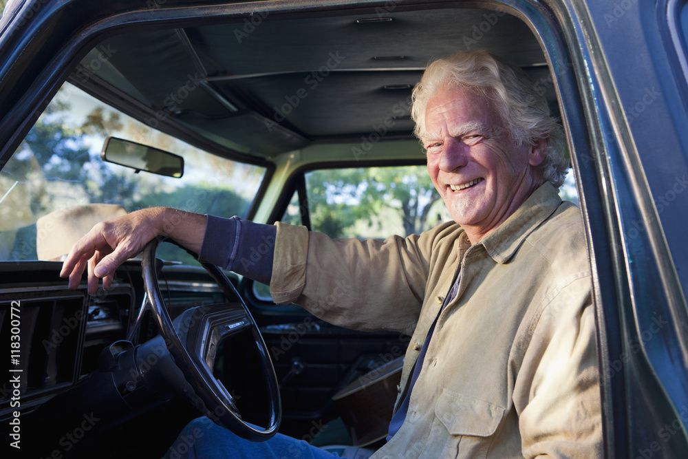 Caucasian man sitting in truck Caucasian man sitting in truck