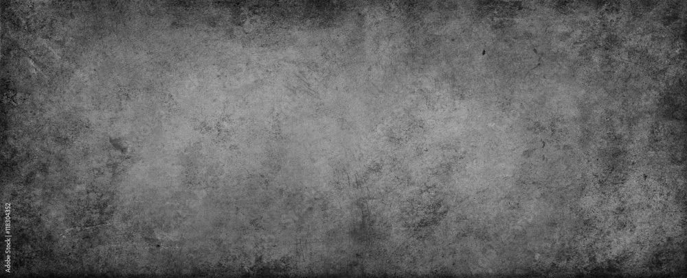 Fototapeta premium Grey textured concrete wall background. Dark edges