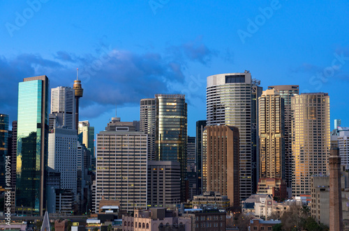 Aerial view of Sydney Central Business District skyscrapers against blue sky on the background. Urban landscape view from above. NSW  Australia