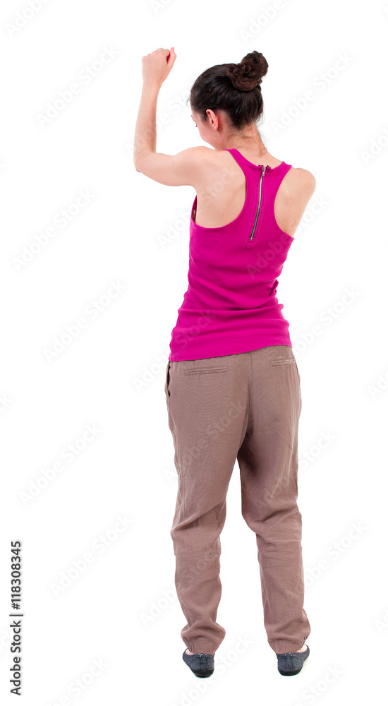 back view of dancing young beautiful woman. girl watching. Rear view people collection. backside view of person. Isolated over white background. dark-skinned girl in a red shirt waving his arms. back view of dancing young beautiful woman. girl watching. Rear view people collection. backside view of person. Isolated over white background. dark-skinned girl in a red shirt waving his arms.