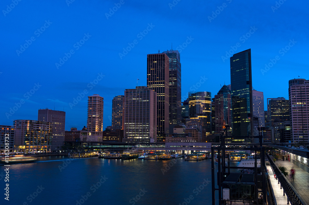 Aerial view of Sydney Central Business District skyscrapers on dusk. Urban landscape view from above. Circular Quay, Australia Aerial view of Sydney Central Business District skyscrapers on dusk. Urban landscape view from above. Circular Quay, Australia