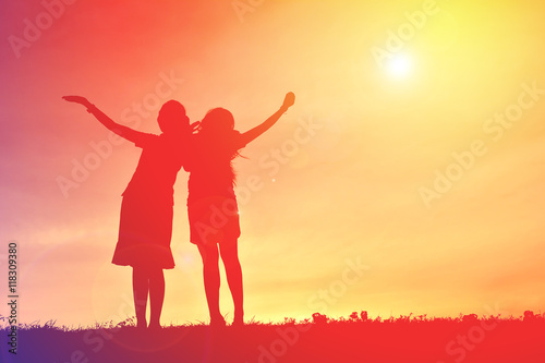 Silhouette beautiful women on sunset. Concept relax time
