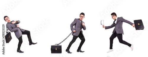 Businessman chained isolated on white