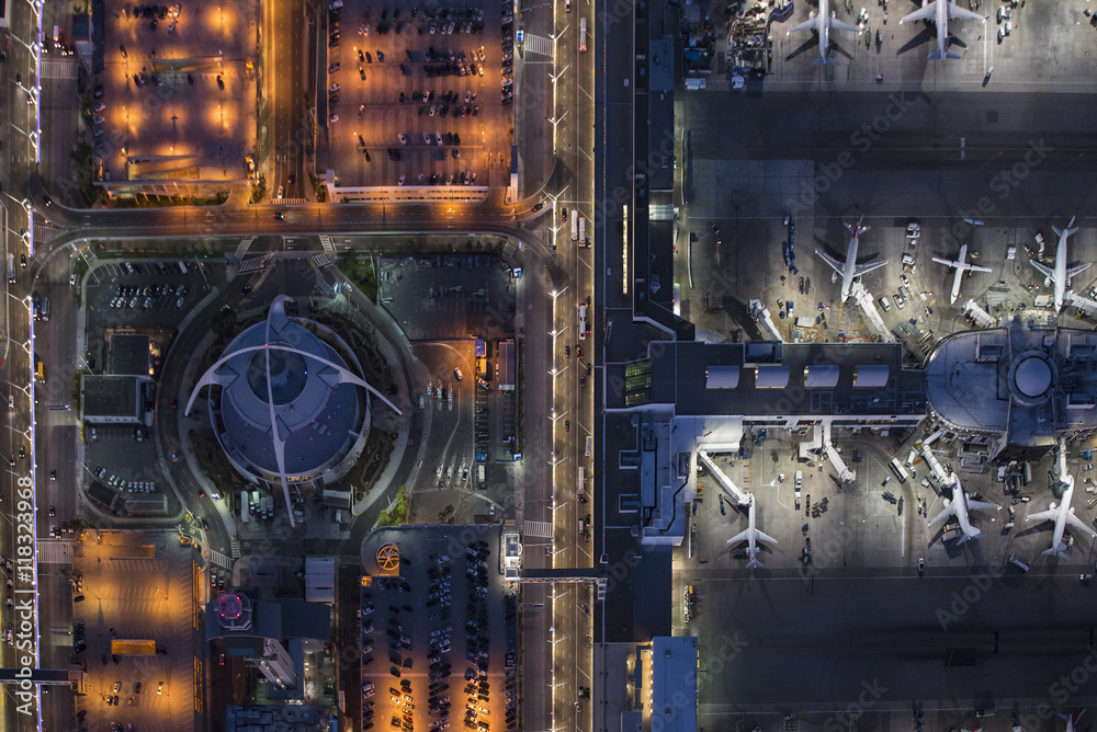 Aerial view of airplanes parked in airport gate Aerial view of airplanes parked in airport gate
