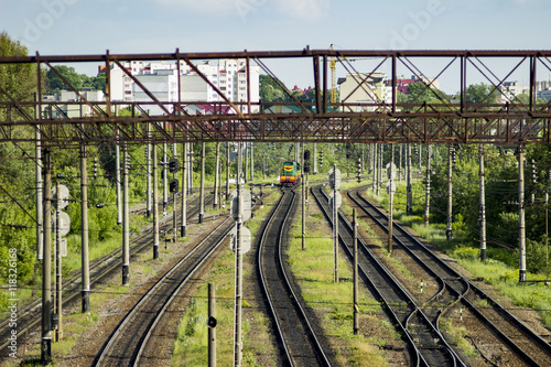 Railway station with train. Urban view