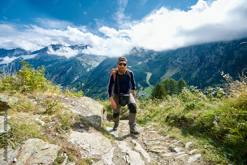 hiker in the Apls mountains. Trek near Matterhorn mount hiker in the Apls mountains. Trek near Matterhorn mount