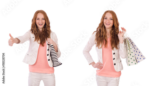 Young woman with shopping bags isolated on white