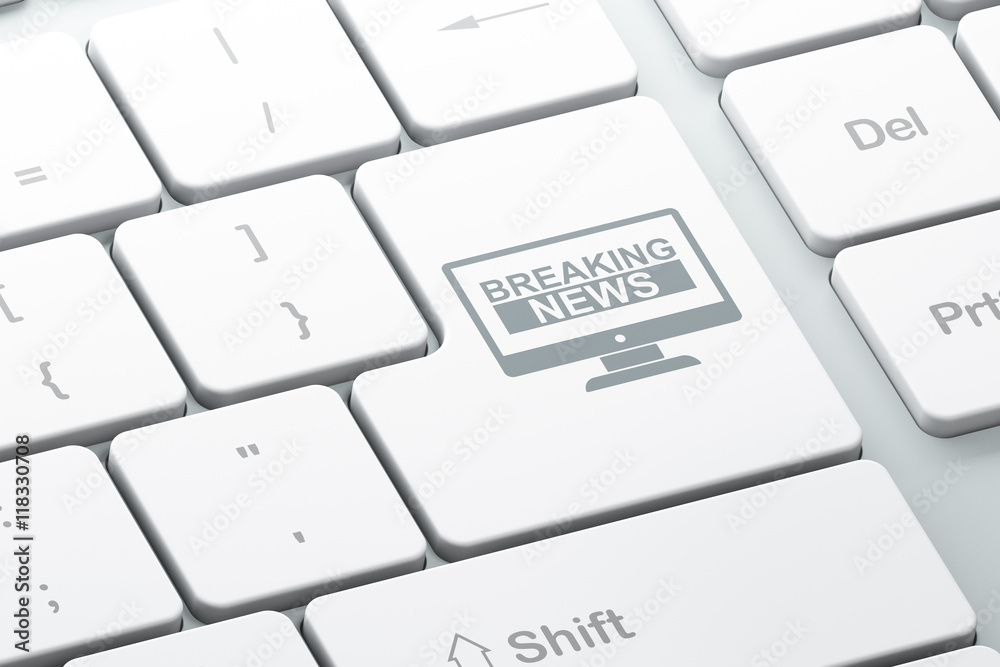 News concept: Breaking News On Screen on computer keyboard background News concept: Breaking News On Screen on computer keyboard background