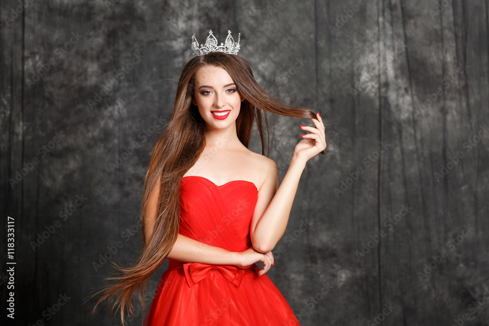 Beauty glamour woman tith red lips crownd and long brunette hair Beauty glamour woman tith red lips crownd and long brunette hair