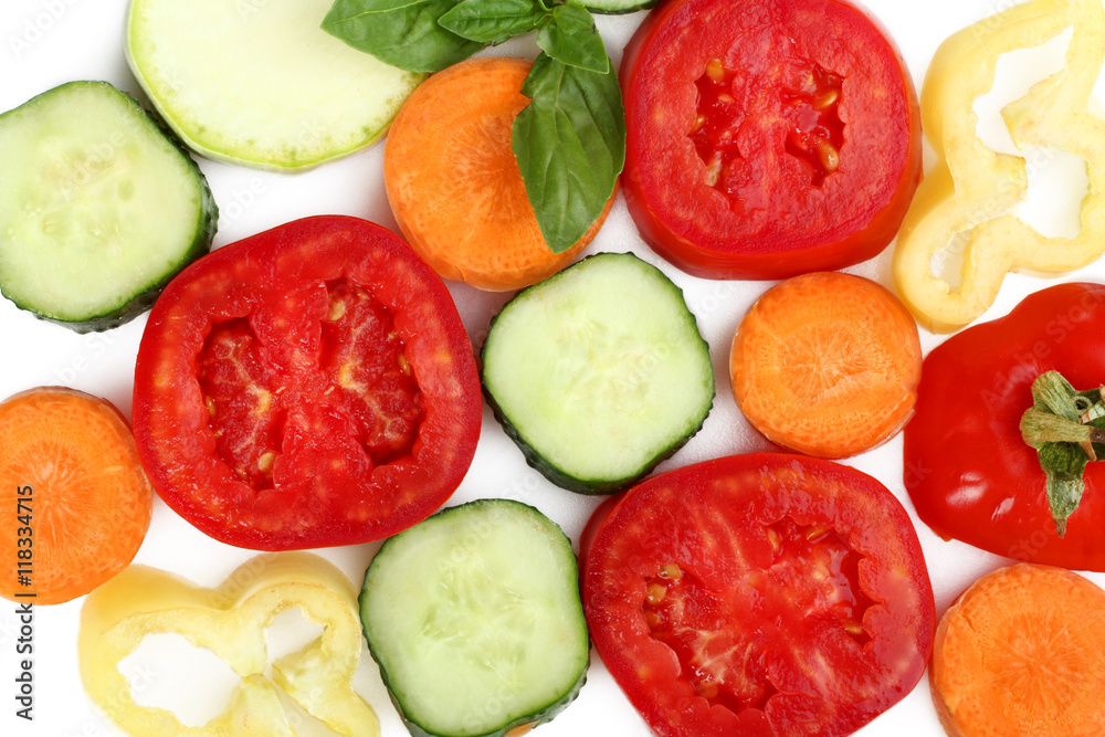 Sliced vegetables on a white isolated background Sliced vegetables on a white isolated background