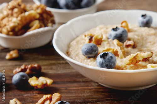 Perfect breakfast. Oatmeal with blueberries. Healthy eating for