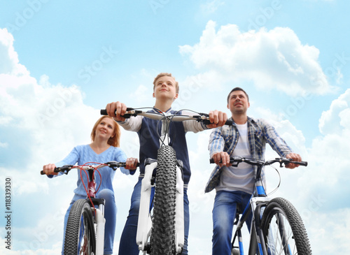 Happy family on bike ride