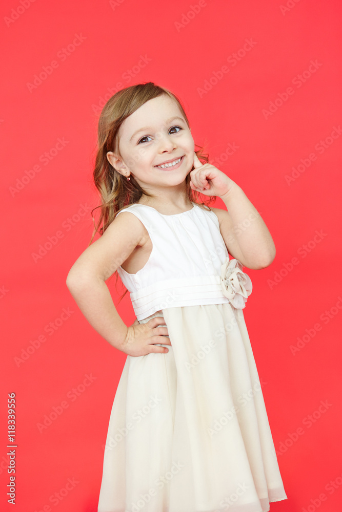 cute little girl in white dress smiling on camera cute little girl in white dress smiling on camera