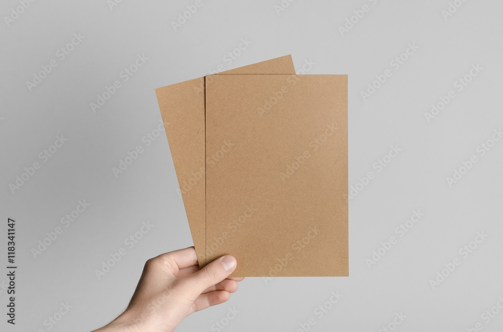 Kraft A5 Flyer Invitation Mock Up Male hands holding kraft