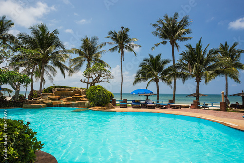 Fototapeta Naklejka Na Ścianę i Meble -  Pool and palms on sea shore. Thailand, Koh Chang,