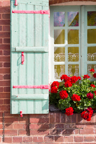 Window with wooden shutters photo