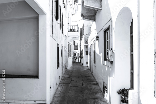 Narrow streets of white mediterranian greek town Mandraki on Nisyros island