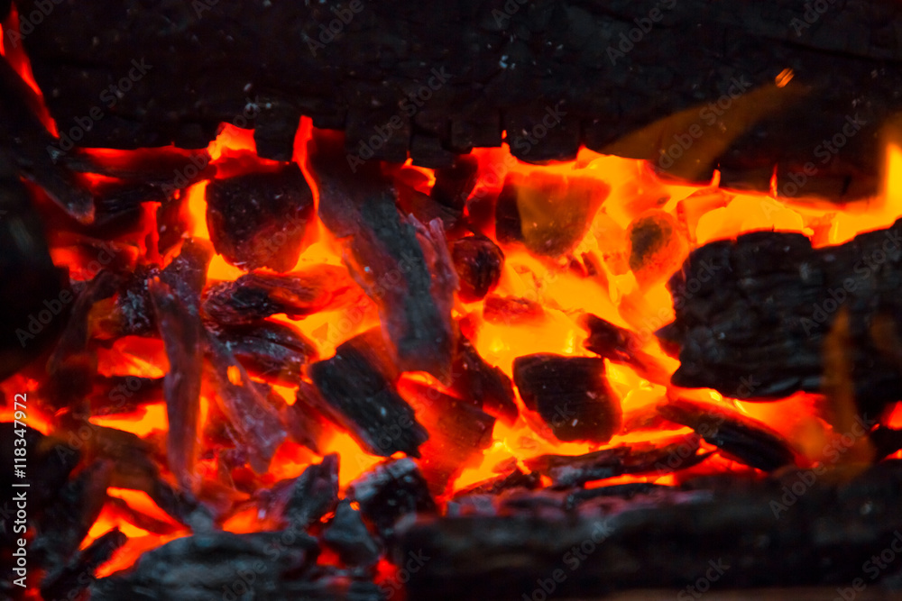 Beautiful burning fire flame background and coals Beautiful burning fire flame background and coals