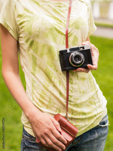 vintage old camera in hand