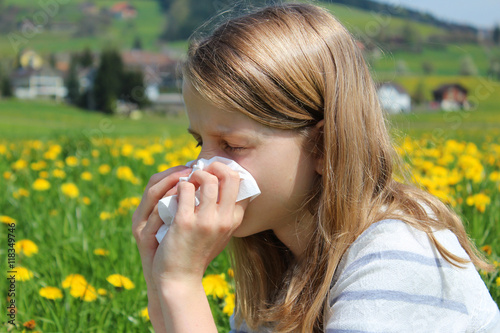 young girl suffering from allergy