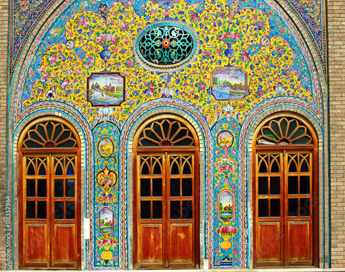 Old ceramic tiles on the wall of the royal palace Golestan in Tehran, Iran photo