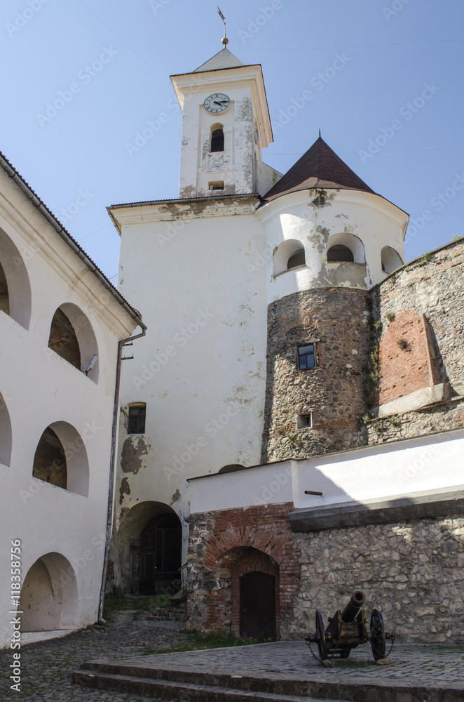 The courtyard and clock tower of the ancient castle Palanok in Mukachevo, Ukraine
