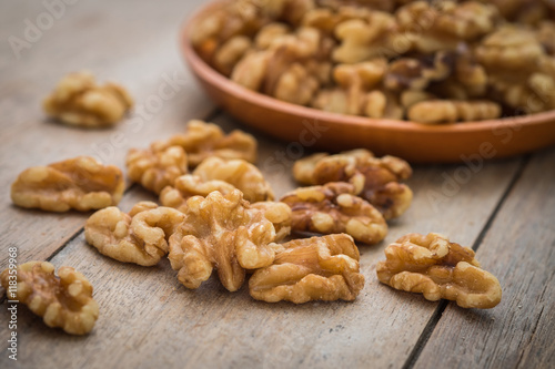 Walnut kernels on wooden table