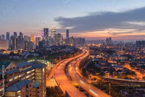 Sunset over city skyline, Kuala Lumpur, Malaysia photo