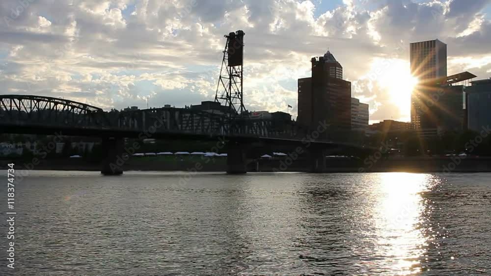 High definition movie of sunset over downtown city skyline of Portland Oregon panning with Hawthorne Bridge along Willamette River 1920x1080 High definition movie of sunset over downtown city skyline of Portland Oregon panning with Hawthorne Bridge along Willamette River 1920x1080