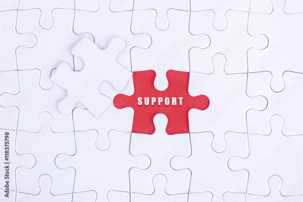 Fototapeta premium Missing white puzzle with SUPPORT word and copyspace area.