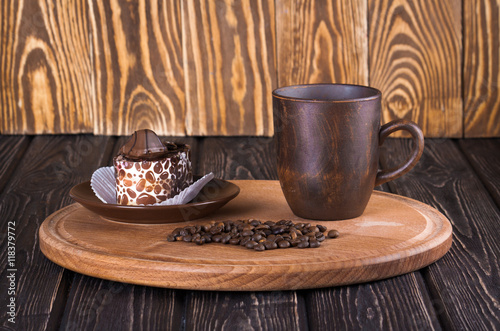 spoon ground coffee with coffee beans