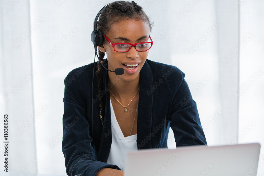 Face of young charming confident woman with headset Face of young charming confident woman with headset