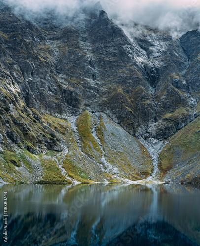 Fototapeta Naklejka Na Ścianę i Meble -  Dramatic view of Black Lake below Mount Rysy, Eastern Tatras, Poland