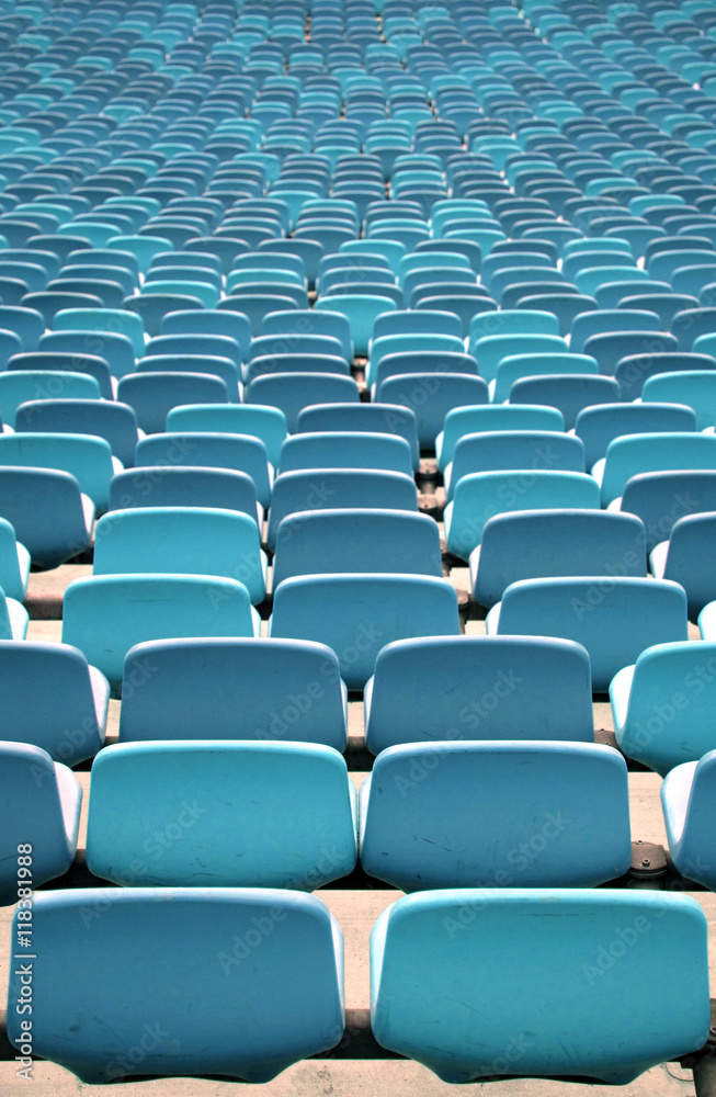 Naklejka premium Green Stadium seating in rows from behind