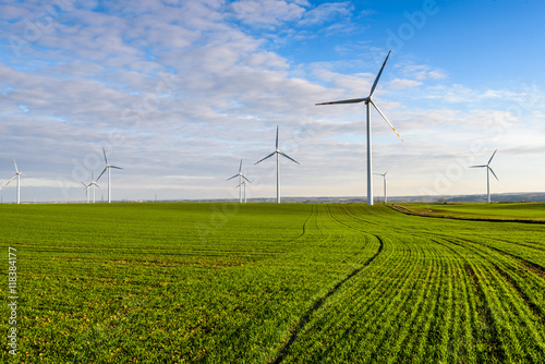 Windmills for electric power production surrounded by agricultural fields in Polish country side. Pomerania  Poland.