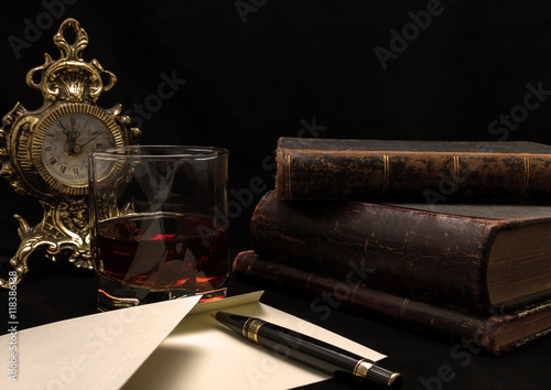 old books, the pen, the letter and serving of whiskey