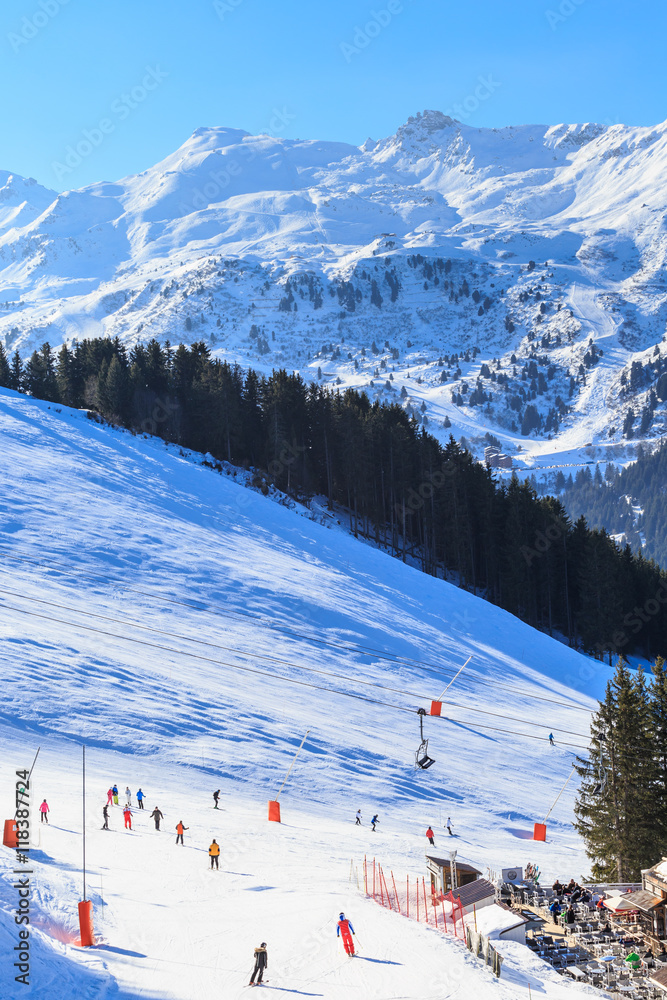 Skiers on the slopes of the ski resort of Meriber. France