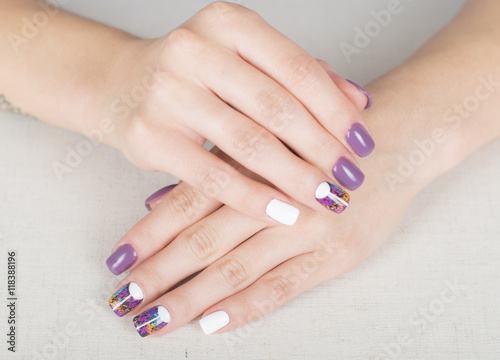 Bright stylish manicure with colored nail gel polish