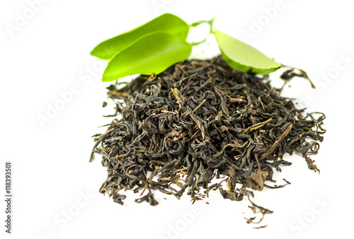 Tea with the green leaves on the white background - isolated