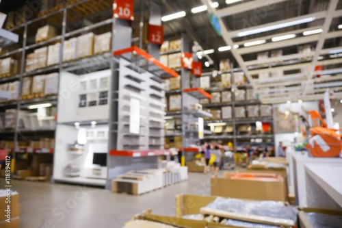 Blurred Background Image of Shelf in Warehouse or Storehouse. © nelzajamal
