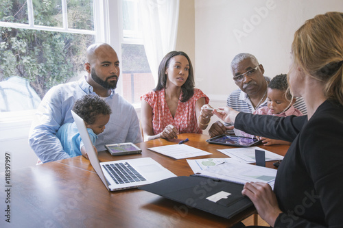 Financial advisor talking to clients