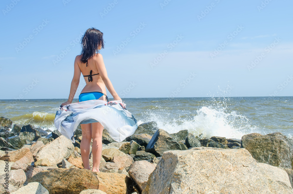 the girl at the sea has a rest